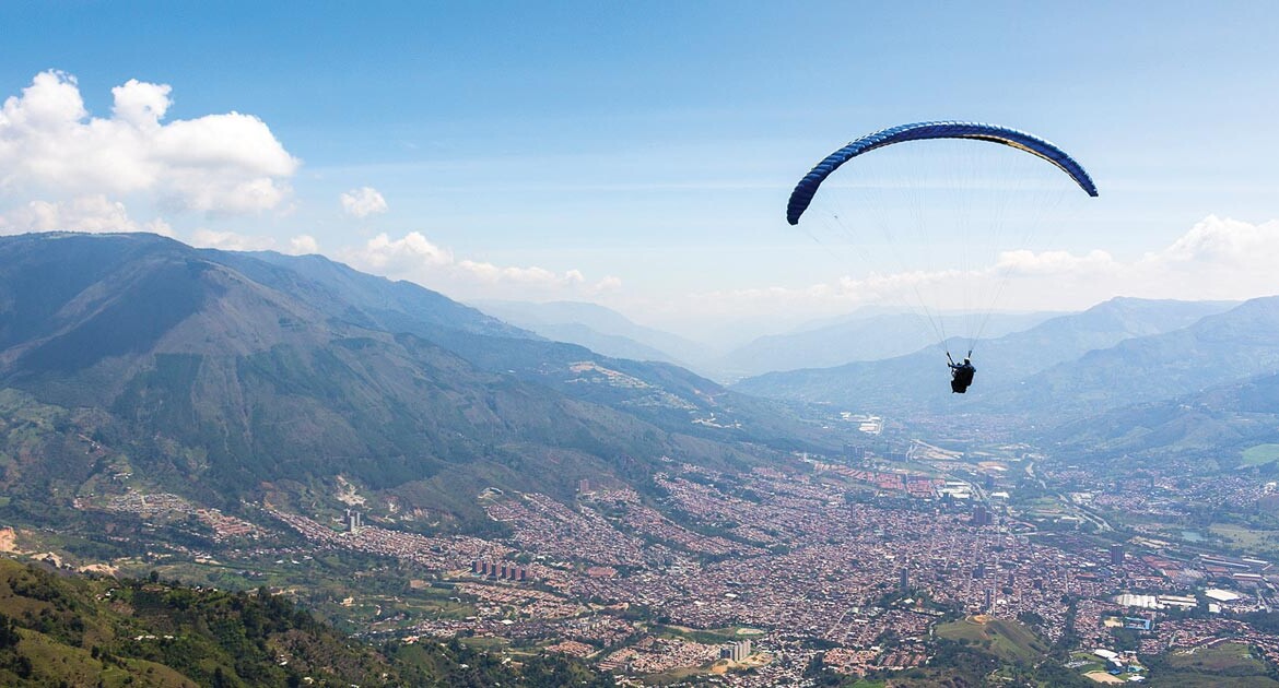 Flying Paragliding Over Medellin